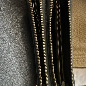 Large coach wallet black with pewter coach logo.